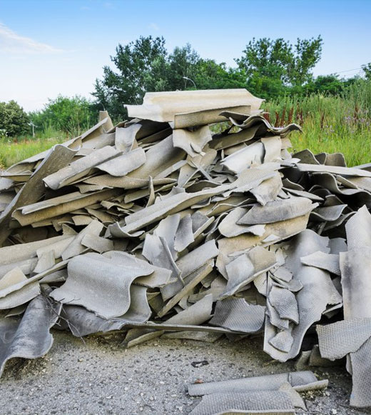 Pile Of Removed Asbestos — Demolishing & Remediation In Heatherbrae, NSW